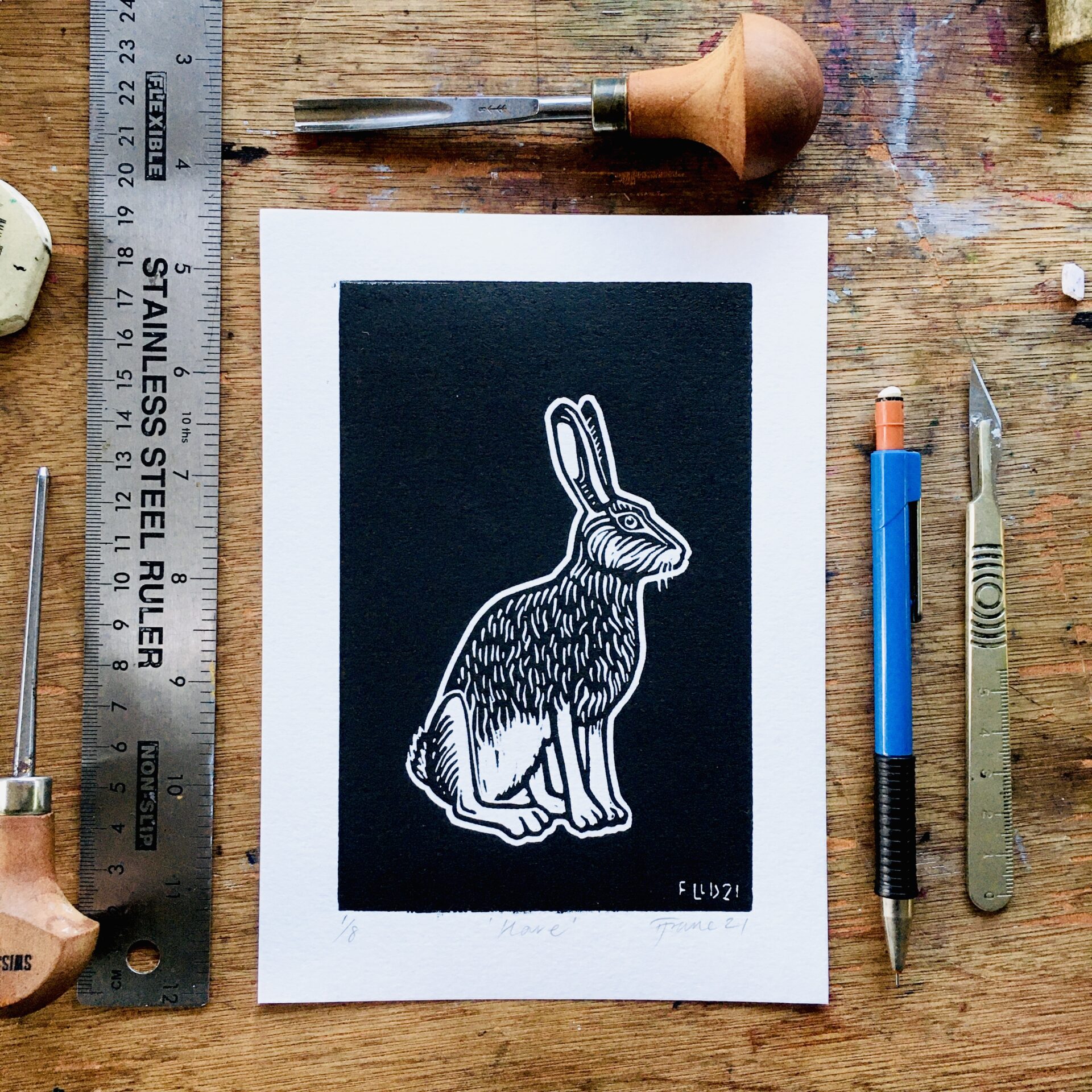 borwn hare lino print art witch black white