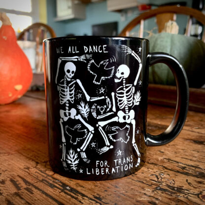 we all dance for trans liberation skeleton mug