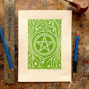 ace of pentacles print - a pentacle surrounded by stylised trees, the branches of the trees have apples and the roots surround skulls