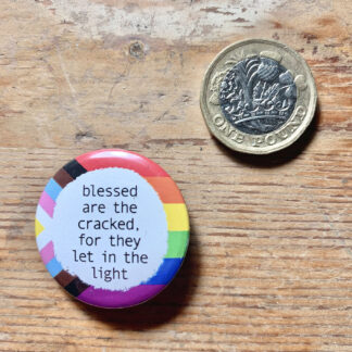 "blessed are the cracked, for they let in the light" queer badge